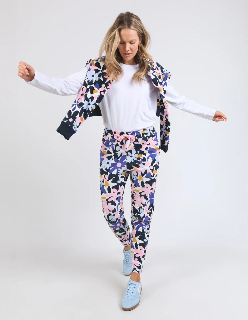 Quincy lounge pant - print-Elm-Exclusive all-over Elm print in stunning pops of floral colour. These 100% cotton lounge pants will uplift your mood and your outfit instantly. The Dressy Tracky Exclusive Elm print Tapered Leg 100% Cotton Model is wearing a size 10-Pash + Evolve