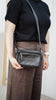 Remi crossbody bag - Black Pebble-Baleka Leather-Chic, compact & endlessly versatile. The Remi is our most versatile and practical bag - thoughtfully designed to keep up with your day. Featuring a front compartment for your must-have essentials, a sleek back pocket with secure press stud closure and a spacious main compartment complete with an internal zip pocket and slip pocket for a neat interior layout. Fully lined and finished with an adjustable strap that can be worn on the shoulder or crossbody, Remi 