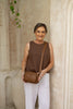 Remi crossbody bag - Camel brown Pebble-Baleka Leather-Chic, compact & endlessly versatile. The Remi is our most versatile and practical bag - thoughtfully designed to keep up with your day. Featuring a front compartment for your must-have essentials, a sleek back pocket with secure press stud closure and a spacious main compartment complete with an internal zip pocket and slip pocket for a neat interior layout. Fully lined and finished with an adjustable strap that can be worn on the shoulder or crossbody,