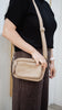 Remi crossbody bag - Cream stone Pebble-Baleka Leather-Chic, compact & endlessly versatile. The Remi is our most versatile and practical bag - thoughtfully designed to keep up with your day. Featuring a front compartment for your must-have essentials, a sleek back pocket with secure press stud closure and a spacious main compartment complete with an internal zip pocket and slip pocket for a neat interior layout. Fully lined and finished with an adjustable strap that can be worn on the shoulder or crossbody,