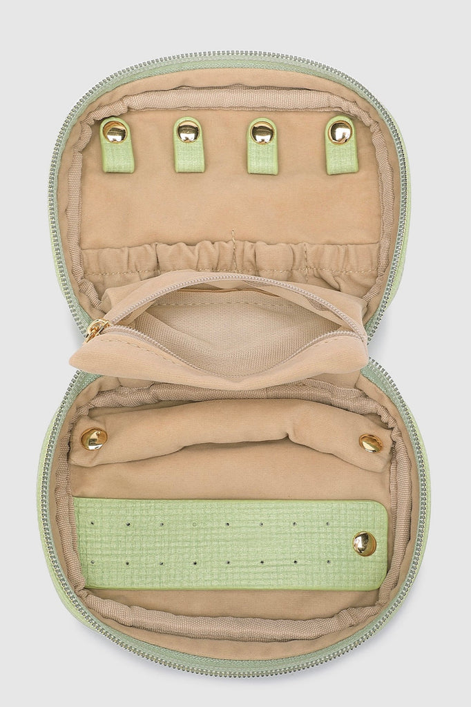 Rita Jewellery Case - Pistachio-Louenhide-The Louenhide Rita Pistachio Jewellery Case is the ideal travel accessory you didn't know you needed. Perfectly sized for travel, this women's jewellery case is a must-have for keeping your jewellery organised and protected on the go. Its sleek design fits effortlessly into your luggage or carry-on, while ensuring your accessories are always secure, organised and ready to shine. Say goodbye to tangled necklaces and lost earrings. With the ultimate internal organisat