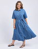 River Denim Dress - Mid Blue Wash-Elm-The River Denim Dress is a lovely long-line dress with a tie waist and button through shirt style dress that looks just as great worn with some comfy sneakers as it does teamed with a sandal or boot. Versatility is key with this dress. Shirt dress style with self fabric waist tie Panel details at skirt Side seam pockets Rigid Denim Model is 171cm and wears Size 10-Pash + Evolve
