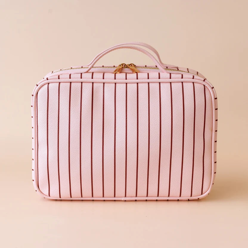 Rosé Pinstripe Cosmetic Bag-Fox & Fallow-The bag of your dreams is here! With so many bonus features, you’ll be wondering where they’ve been all your life. The miracle pop out bag everyone’s been talking about. The ingenious removable clear bag is the true MVP here: it pops out of the main bag and it’s perfect for all your makeup & skincare essentials so you can find them easily through the clear plastic sides. Take it out and use it for your daily makeup & skincare routine or separately at airport securit