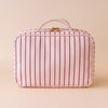 Rosé Pinstripe Cosmetic Bag-Fox & Fallow-The bag of your dreams is here! With so many bonus features, you’ll be wondering where they’ve been all your life. The miracle pop out bag everyone’s been talking about. The ingenious removable clear bag is the true MVP here: it pops out of the main bag and it’s perfect for all your makeup & skincare essentials so you can find them easily through the clear plastic sides. Take it out and use it for your daily makeup & skincare routine or separately at airport securit