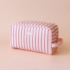 Rosè pinstripe wash bag-Fox & Fallow-The bag of your dreams is here! With so many bonus features, you’ll be wondering where they’ve been all your life. Beautiful, but practical. Perfect as an everyday make up bag or for all your bathroom essentials for the next work trip or vacay. Crafted from super soft, yet durable luxury pebble vegan leather it's easy to keep clean - simply wipe down with a damp cloth. The monogrammed tan lining is designed to hide make up or spills but also makes it easy to find all yo