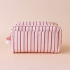 Rosè pinstripe wash bag-Fox & Fallow-The bag of your dreams is here! With so many bonus features, you’ll be wondering where they’ve been all your life. Beautiful, but practical. Perfect as an everyday make up bag or for all your bathroom essentials for the next work trip or vacay. Crafted from super soft, yet durable luxury pebble vegan leather it's easy to keep clean - simply wipe down with a damp cloth. The monogrammed tan lining is designed to hide make up or spills but also makes it easy to find all yo