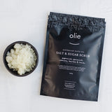 Salt & Sugar Scrub Pouch-Olieve + Olie-The combination of artesian salt and olive oil create a superb exfoliation leaving your skin renewed and glowing. The salt stimulates and lifts dead skin cells while the antioxidants of the olive oil penetrate deeply to naturally provide anti-ageing benefits. Made entirely from natural ingredients this product is suitable for even the most sensitive skin types. The salt scrub pouch is a gentle scrub and great for more sensitive areas like the face. The salt and olive o