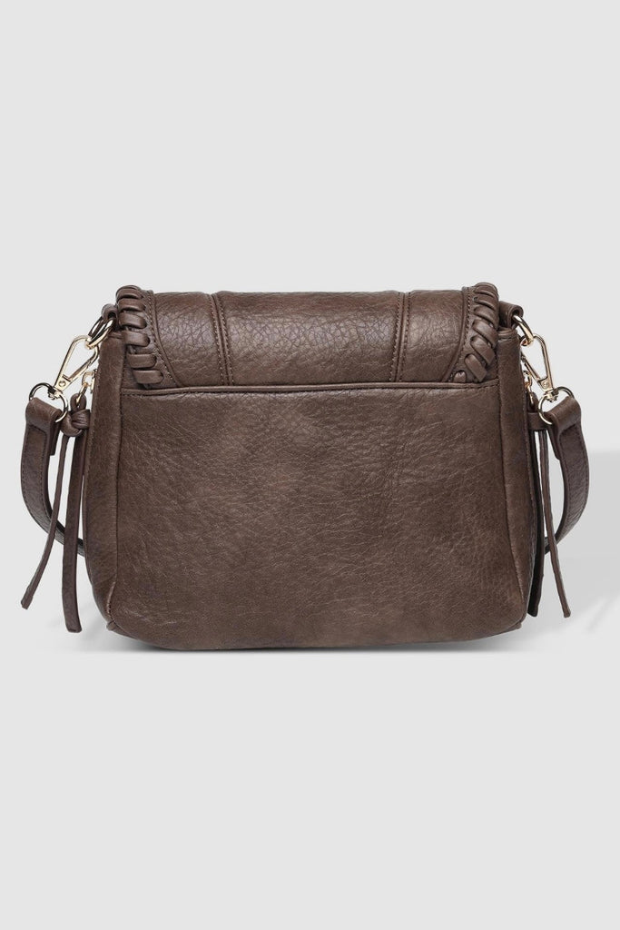 Shania Crossbody Bag - Chocolate-Louenhide-The Louenhide Shania Chocolate Crossbody Bag is the epitome of elevated style that complements your everyday ensemble. Available in a range of seasonal neutrals, this trending casual women's crossbody bag features a subtle woven vegan leather trim that adds a touch of effortless sophistication to your year-round capsule wardrobe. With a spacious and organised interior that fits your everyday essentials, you can keep your belongings safe with the magnetic clasp flap