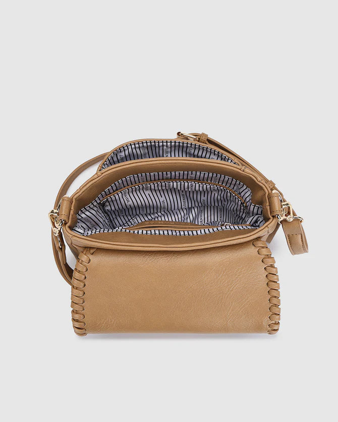 Shania crossbody bag - camel-Louenhide-The Louenhide Shania Camel Crossbody Bag is the epitome of elevated style that complements any summer ensemble. Available in a range of timeless summer neutrals, this casual women's crossbody bag features a subtle woven vegan leather trim that adds a touch of effortless sophistication to your summer capsule wardrobe. With a spacious and organised interior that fits your everyday essentials, you can keep your belongings safe with the magnetic clasp flap closure. With it