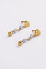 Shelly drop earring - gold-Zarla-A delicate drop earring finished with a sculpted shell detail and soft tonal accents. Light-catching and full of movement, it brings a gentle, coastal feel to your look. Feminine, effortless, and designed for everyday wear. *18K Gold Plated Solid Brass Base *Water proof: Can be worn in the ocean or pool-Pash + Evolve
