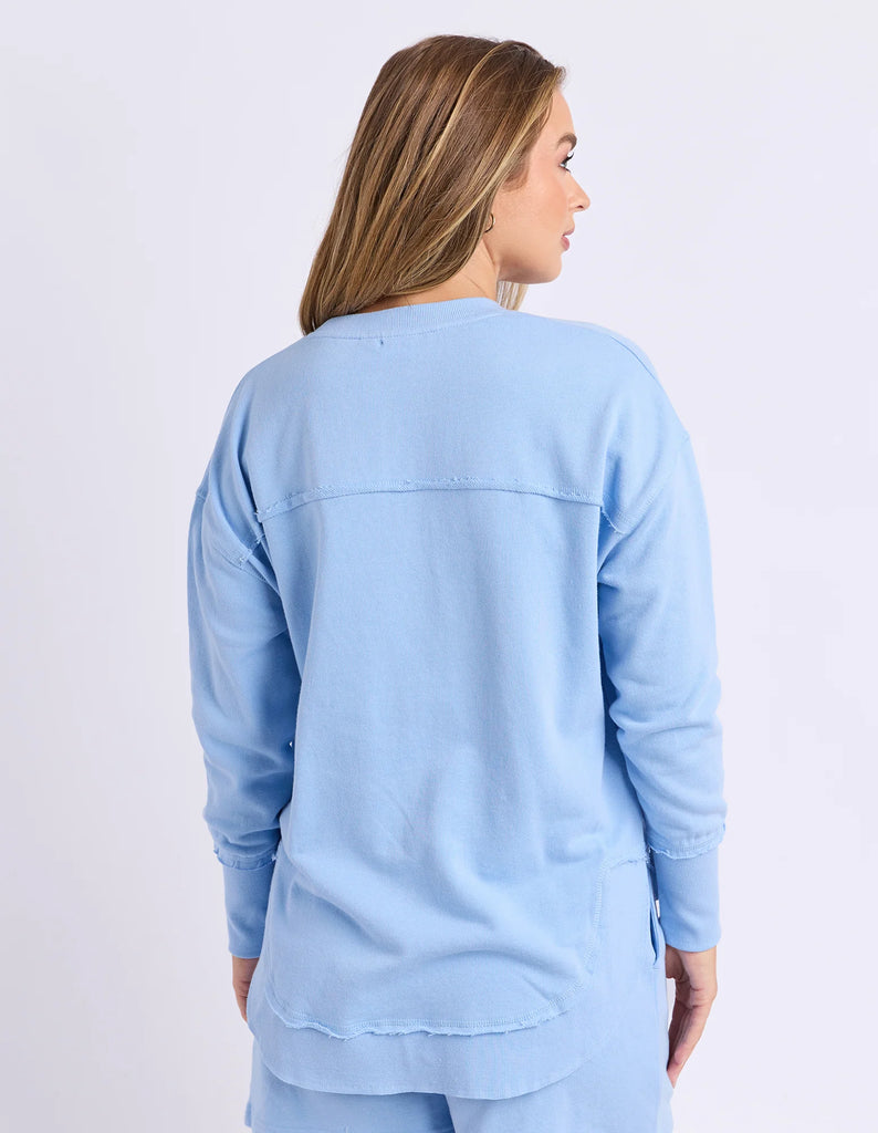 Simplified Confetti Crew - Bluebell-Foxwood-Say hello to your new feel-good fave. The Simplified Confetti Crew brings all the comfort with a playful twist. With multicoloured embroidery on the chest, raw edge details, and a curved hem that flatters every fit, it's the kind of piece you'll want to wear on repeat. Easy to throw on, even easier to love. One colour just won’t be enough. Front chest multicoloured embroidery Raw edge detail Curved hem 100% Cotton Our model is 176cm and wears Size 10-Pash + Evolv