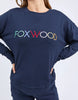 Simplified Confetti Crew - Navy-Foxwood-Say hello to your new feel-good fave. The Simplified Confetti Crew brings all the comfort with a playful twist. With multicoloured embroidery on the chest, raw edge details, and a curved hem that flatters every fit, it's the kind of piece you'll want to wear on repeat. Easy to throw on, even easier to love. One colour just won’t be enough. Front chest multicoloured embroidery Raw edge detail Curved hem 100% Cotton Model is wearing a size 10-Pash + Evolve