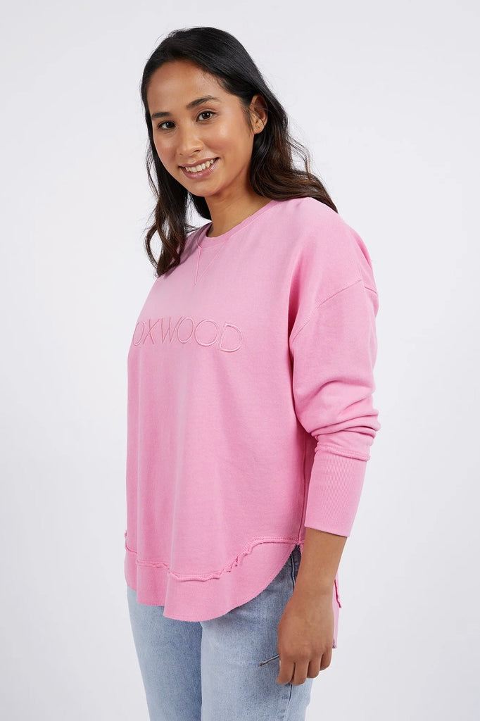 Simplified Crew - Bubblegum Pink-Foxwood-The Simplified Crew is the perfect throw over for your everyday wardrobe. With its round neck, hi-lo hemline, side splits with raw edging & the classic Foxwood logo, you are going to want one in every colour. 100% UNBRUSHED COTTON FLEECE Our model wears size 10-Pash + Evolve