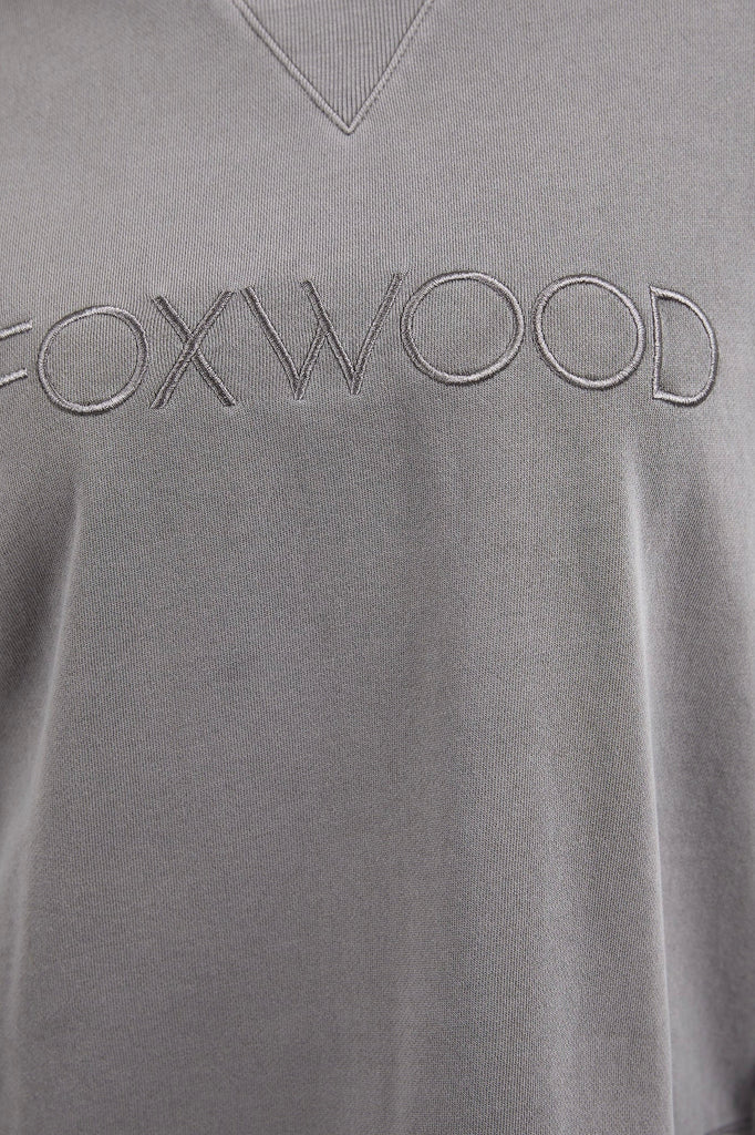 Simplified Crew - Charcoal-Foxwood-The Simplified Crew is the perfect throw over for your everyday wardrobe. With its round neck, hi-lo hemline, side splits with raw edging & the classic Foxwood logo, you are going to want one in every colour. 100% UNBRUSHED COTTON FLEECE Our model wears size 10 Designed in Australia-Pash + Evolve
