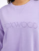 Simplified Crew - Lavender-Foxwood-The Simplified Crew is the perfect throw over for your everyday wardrobe. With its round neck, hi-lo hemline, side splits with raw edging & the classic Foxwood logo, you are going to want one in every colour. Front chest embroidery Raw edge detail Curved hem 100% Cotton Model is wearing a size 10-Pash + Evolve