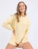Simplified Crew - Lemon-Foxwood-The Simplified Crew is the perfect throw over for your everyday wardrobe. With its round neck, hi-lo hemline, side splits with raw edging & the classic Foxwood logo, you are going to want one in every colour. Front chest embroidery Raw edge detail Curved hem 100% Cotton Model is wearing a size 10-Pash + Evolve