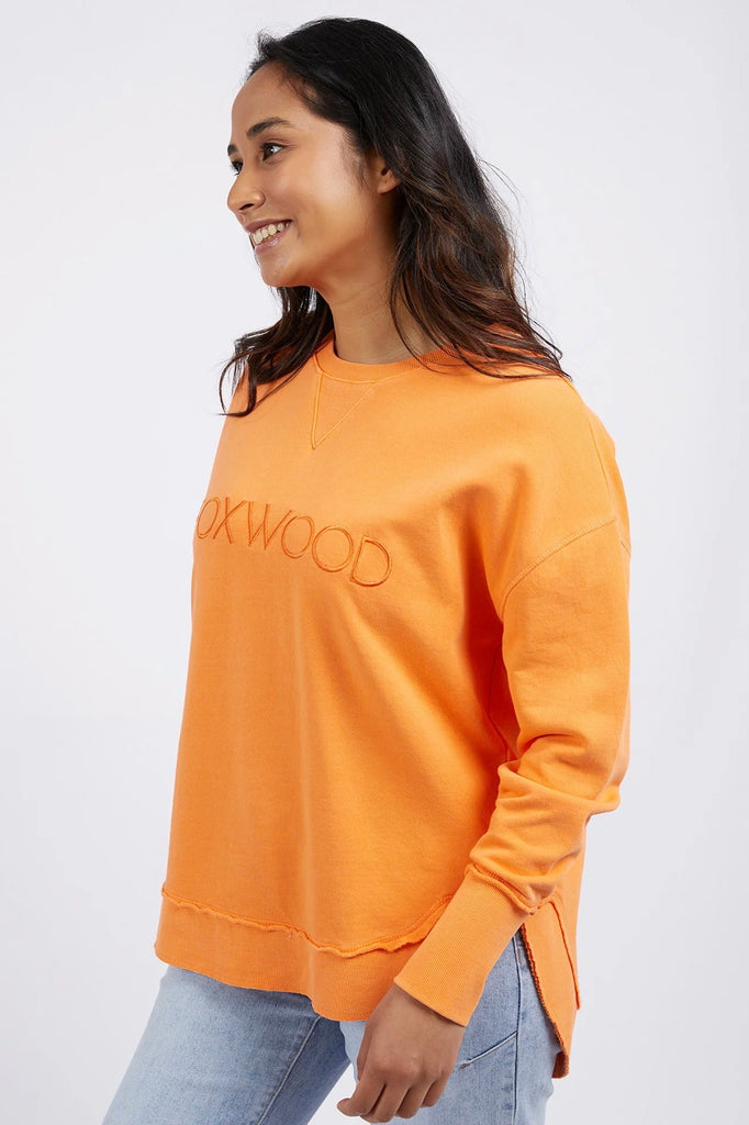 Simplified Crew - Orange-Foxwood-The Simplified Crew is the perfect throw over for your everyday wardrobe. With its round neck, hi-lo hemline, side splits with raw edging & the classic Foxwood logo, you are going to want one in every colour. 100% UNBRUSHED COTTON FLEECE Our model wears size 10-Pash + Evolve