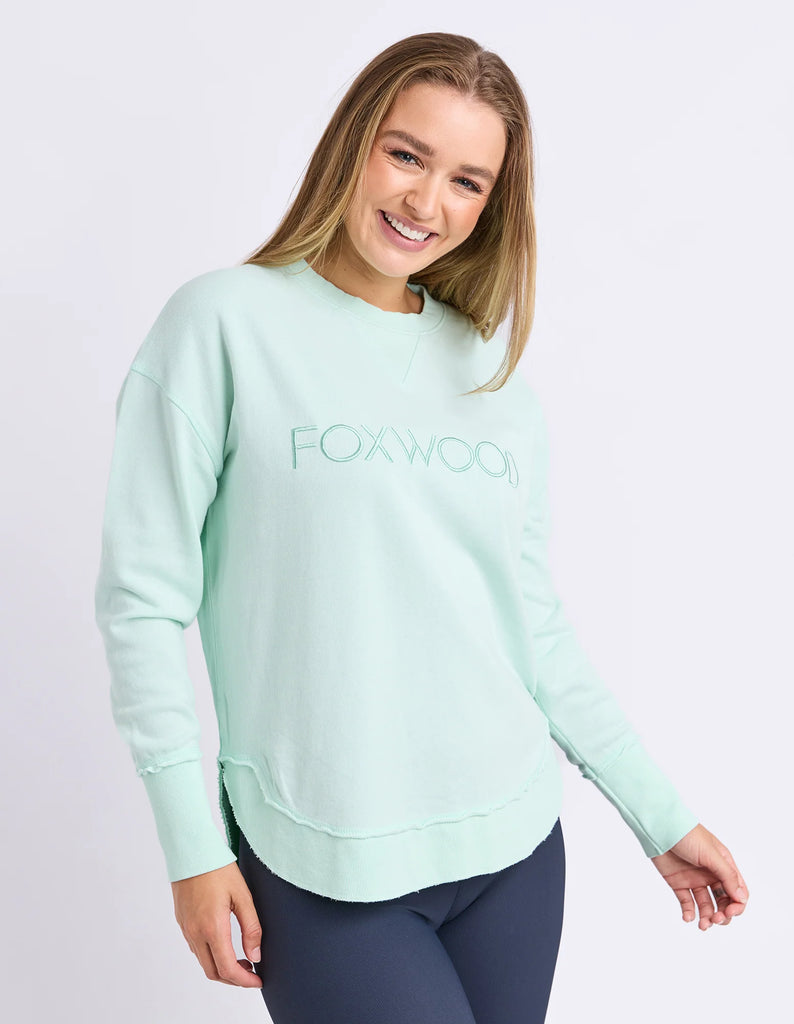 Simplified Crew - Pale Mint-Foxwood-The Simplified Crew is the perfect throw over for your everyday wardrobe. With its round neck, hi-lo hemline, side splits with raw edging & the classic Foxwood logo, you are going to want one in every colour. Front chest embroidery Raw edge detail Curved hem 100% Cotton Our model is 176cm and wears Size 10-Pash + Evolve