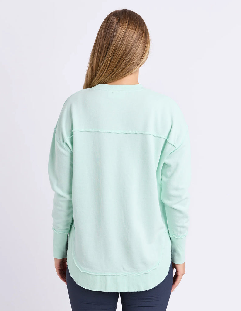 Simplified Crew - Pale Mint-Foxwood-The Simplified Crew is the perfect throw over for your everyday wardrobe. With its round neck, hi-lo hemline, side splits with raw edging & the classic Foxwood logo, you are going to want one in every colour. Front chest embroidery Raw edge detail Curved hem 100% Cotton Our model is 176cm and wears Size 10-Pash + Evolve