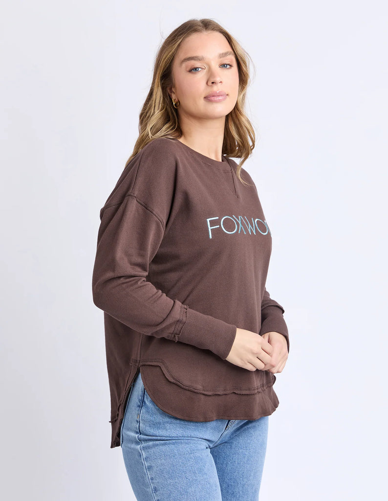 Simplified Metallic Crew - Coffee/Light Blue-Foxwood-The Bling version of our Best Selling Simplified Crew. This crew is the perfect throw over for your everyday wardrobe. With its round neck, hi-lo hemline, side splits with raw edging & the classic Foxwood logo, you are going to want one in every colour. The Metallic Crew has a stunning lurex thread run through the Foxwood embroidery for that little bit 'extra'. Front chest embroidery Raw edge detail Curved hem 100% Cotton Our model is 176cm and wears Siz