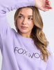 Simplified Metallic Crew - Lavender-Foxwood-The Bling version of our Best Selling Simplified Crew. This crew is the perfect throw over for your everyday wardrobe. With its round neck, hi-lo hemline, side splits with raw edging & the classic Foxwood logo, you are going to want one in every colour. The Metallic Crew has a stunning lurex thread run through the Foxwood embroidery for that little bit 'extra'. Front chest embroidery Raw edge detail Curved hem 100% Cotton Our model is 176cm and wears Size 10-Pash