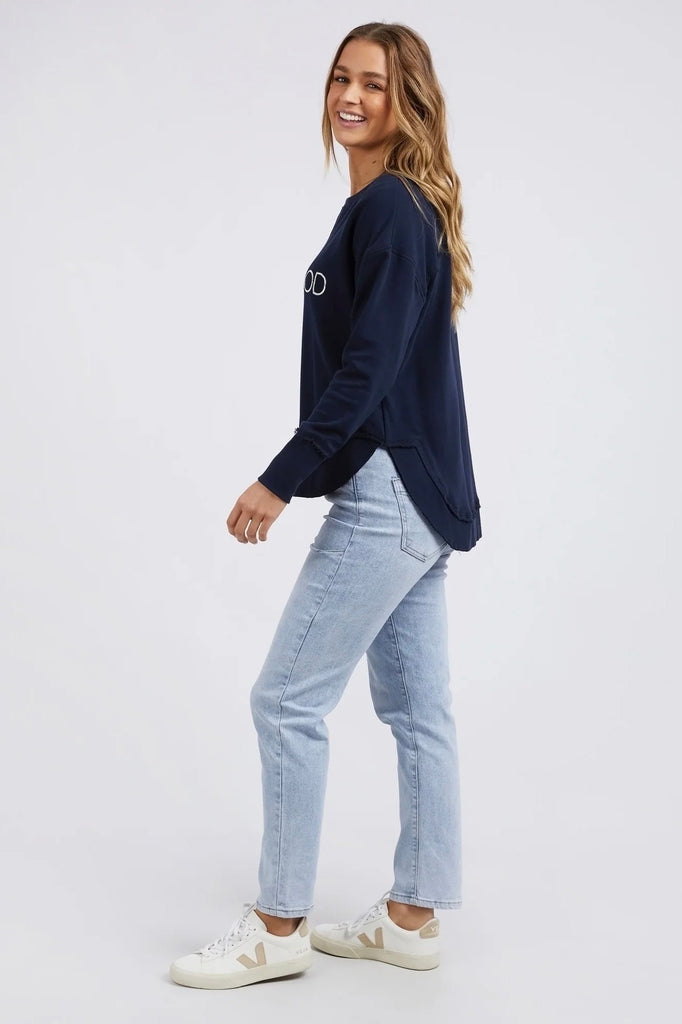 Simplified Metallic Crew - Navy-Foxwood-Say hello to our bling version! If you can't help yourself when it comes to a touch of glitz, then the Metallic Simplified Crew is the perfect addition to your everyday wardrobe. Its round neck, hi-lo hemline, side splits with raw edging and classic Foxwood logo will make you want one in every colour. Everyone loves this best selling crew from Foxwood Clothing. Round crew neckline Classic Foxwood chest logo in lurex metallic thread Side splits Raw edging on cuffs and 