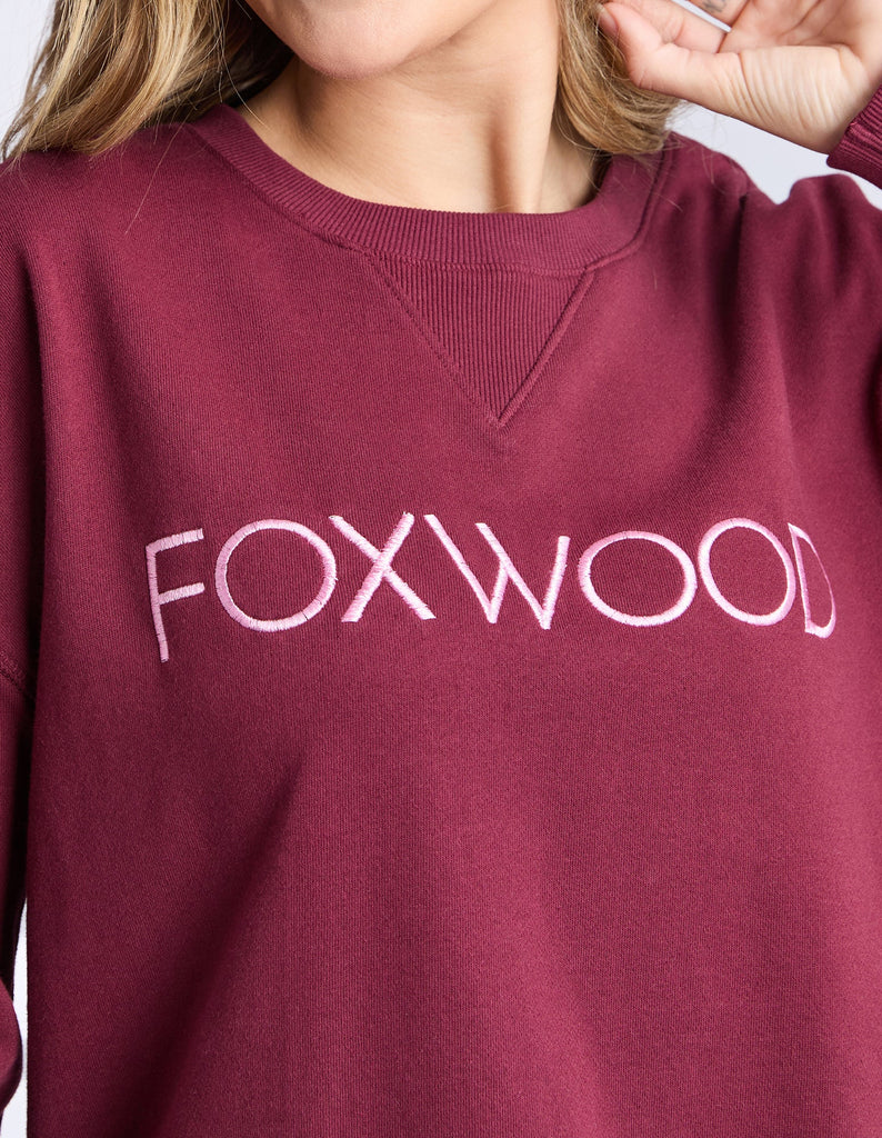Simplified Metallic Crew - Port-Foxwood-The Bling version of our Best Selling Simplified Crew. This crew is the perfect throw over for your everyday wardrobe. With its round neck, hi-lo hemline, side splits with raw edging & the classic Foxwood logo, you are going to want one in every colour. The Metallic Crew has a stunning lurex thread run through the Foxwood embroidery for that little bit 'extra'. Front chest embroidery Raw edge detail Curved hem 100% Cotton Our model is 176cm and wears Size 10-Pash + Ev