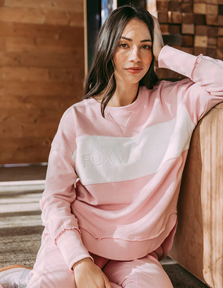 Simplified Tonal Crew - Blossom-Foxwood-Tonal dressing is the ultimate in versatility. For those who love a coordinated look that doesn't stray too far into colour, the tonal Simplified Crew is for you. Its round neck, hi-lo hemline, side splits with raw edging, and classic Foxwood logo insert into the tonal colour panel are tonal dressing perfection. Everyone loves this best-selling crew from Foxwood Clothing. Front chest embroidery Raw edge detail Contrast chest panel Unbrushed Cotton Fleece-Pash + Evolve