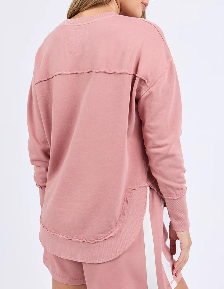 Simplified crew - dusty rose-Foxwood-The Simplified Crew is the perfect throw over for your everyday wardrobe. With its round neck, hi-lo hemline, side splits with raw edging & the classic Foxwood logo, you are going to want one in every colour. Front chest embroidery Raw edge detail Curved hem 100% Cotton Model is wearing size 10-Pash + Evolve