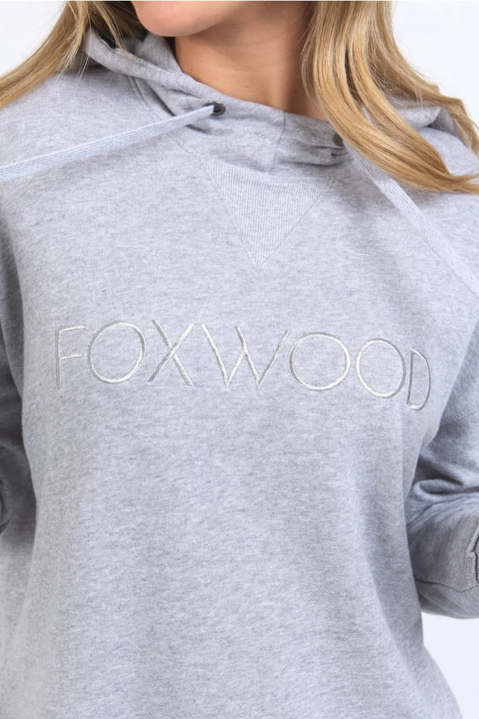 Simplified metallic hoodie - grey marle-Foxwood-Your everyday go-to just got a cozy upgrade. The Simplified Hoodie features the same relaxed vibe as our best-selling crew, with a soft hood and adjustable drawstrings for extra comfort. The hi-lo hemlie and side splits with raw edging are all there, with the signature Foxwood logo for that effortless, stylish touch. Perfect for layering or wearing solo, this hoodie is your new favorite for easy, all-day wear. You’ll want one in every color! Front chest embroi
