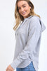 Simplified metallic hoodie - grey marle-Foxwood-Your everyday go-to just got a cozy upgrade. The Simplified Hoodie features the same relaxed vibe as our best-selling crew, with a soft hood and adjustable drawstrings for extra comfort. The hi-lo hemlie and side splits with raw edging are all there, with the signature Foxwood logo for that effortless, stylish touch. Perfect for layering or wearing solo, this hoodie is your new favorite for easy, all-day wear. You’ll want one in every color! Front chest embroi
