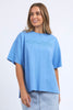 Simplified tee - Blue-Foxwood-The Simplified Tee is the perfect throw over for your everyday wardrobe. With its round neck, hi-lo hemline, side splits with raw edging & the classic Foxwood logo, you are going to want one in every colour. Front chest embroidery Round neckline Relaxed fit 100% Cotton Our model is 176cm and wears Size 10-Pash + Evolve