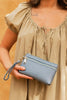 Spencer Travel Purse - Dusty Blue-Louenhide-The Louenhide Spencer Dusty Blue Travel Purse is the perfect companion for the modern adventurer. This compact and versatile wallet is designed to seamlessly blend style with functionality, making it an essential accessory for your journeys near and far. With a focus on compact elegance, this women's travel wallet ensures it can store your essentials in the slip and zip pockets. From your passport, cash and cards to even your phone, this affordable travel accessor