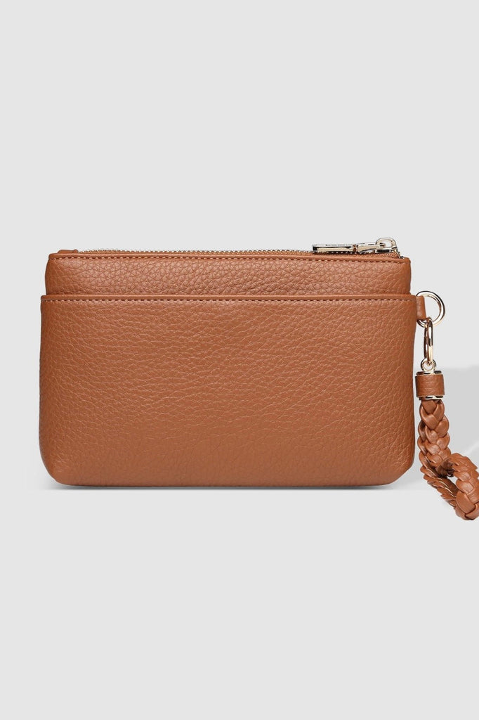 Spencer Travel Purse - Tan-Louenhide-The Louenhide Spencer Tan Travel Purse is the perfect companion for the modern adventurer. This compact and versatile wallet is designed to seamlessly blend style with functionality, making it an essential accessory for your journeys near and far. With a focus on compact elegance, this women's travel wallet ensures it can store your essentials in the slip and zip pockets. From your passport, cash and cards to even your phone, this affordable travel accessory will complem