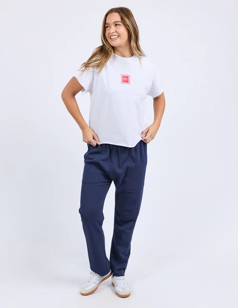 Stamp Tee - White-Foxwood-Give your look a twist with the Stamp Tee. Featuring raw edge detailing that’s all about laid-back cool. It’s the perfect little rough-around-the-edges touch that adds personality and keeps things fresh. Front chest embroidery Round neckline Raw edge detail 100% Cotton Model is wearing a size 10-Pash + Evolve