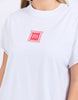 Stamp Tee - White-Foxwood-Give your look a twist with the Stamp Tee. Featuring raw edge detailing that’s all about laid-back cool. It’s the perfect little rough-around-the-edges touch that adds personality and keeps things fresh. Front chest embroidery Round neckline Raw edge detail 100% Cotton Model is wearing a size 10-Pash + Evolve