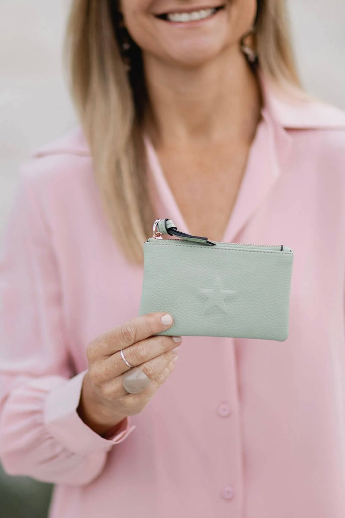 Star purse - mint-Louenhide-The Louenhide Star Purse is a sweet coin purse that adds an element of fun to any outfit. Complete with three card slots and a handy key ring chain, this mini purse will keep your small essentials organised, day to night. The Star purse is a thoughtful gift for bridesmaids, birthdays or someone special and is available in a variety of fun colours. Internal Features 3 Card Slots, Key Ring Chain External Features Key Ring Chain Internal Lining 100% Recycled Polyester Black and Whit