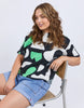 Stijl tee - abstract-Elm-Redefine comfort and chic with the Stijl Tee a fresh take on gorgeous geometric designs. Every wardrobe deserves a little fun – and this brings it. Exclusive Elm print Drop shoulder 100% Cotton Model is wearing a size 10-Pash + Evolve