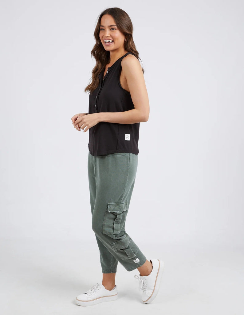 Suri Tank Washed Black-Elm-The Ideal Seasonal Tank. The Suri Tank In A Lightweight Hemp And Cotton Blend Is The Ultimate And Laid Back Style. Featuring Raw Edge Detail On The Neck And Sleeve And Buttons On The Front Placket, Team With The Suri Cargo Pant For The Ultimate Relaxed Seasonal Look. Half Button Front Raw Edge Detail on Neckline & Sleeve Relaxed Fit Cotton Hemp Blend Model is 169cm and wears Size 10-Pash + Evolve