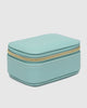 Suzie Jewellery Box - Mint-Louenhide-The Louenhide Suzie Mint Jewellery Box is a sweet travel companion ready to store all of your rings, necklaces, bracelets, and earrings. Use every day and stow in your bag for on-the-go use, or pack for weekend adventures. Featuring three ring rolls, two compartments, and an elasticated slip pocket, your precious gems will be secured safely. Internal Features 2 Ring Rolls, Elastic Slip Pocket, 2 Compartments Internal Lining Faux Suede 100% Lining Closure Secure Zip Body 