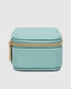 Suzie Jewellery Box - Mint-Louenhide-The Louenhide Suzie Mint Jewellery Box is a sweet travel companion ready to store all of your rings, necklaces, bracelets, and earrings. Use every day and stow in your bag for on-the-go use, or pack for weekend adventures. Featuring three ring rolls, two compartments, and an elasticated slip pocket, your precious gems will be secured safely. Internal Features 2 Ring Rolls, Elastic Slip Pocket, 2 Compartments Internal Lining Faux Suede 100% Lining Closure Secure Zip Body 