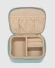 Suzie Jewellery Box - Mint-Louenhide-The Louenhide Suzie Mint Jewellery Box is a sweet travel companion ready to store all of your rings, necklaces, bracelets, and earrings. Use every day and stow in your bag for on-the-go use, or pack for weekend adventures. Featuring three ring rolls, two compartments, and an elasticated slip pocket, your precious gems will be secured safely. Internal Features 2 Ring Rolls, Elastic Slip Pocket, 2 Compartments Internal Lining Faux Suede 100% Lining Closure Secure Zip Body 