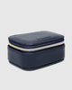 Suzie jewellery box - navy-Louenhide-The Louenhide Suzie Navy Jewellery Box is a sweet travel companion ready to store all of your rings, necklaces, bracelets, and earrings. Use every day and stow in your bag for on-the-go use, or pack for weekend adventures. Featuring three ring rolls, two compartments, and an elasticated slip pocket, your precious gems will be secured safely. Internal Features 2 Ring Rolls, Elastic Slip Pocket, 2 Compartments Internal Lining Faux Suede 100% Lining Closure Secure Zip Body 