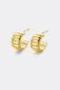 Tess earring - gold-Zafino-The Tess Earring in gold is a chunky, sculptural take on the classic huggie. Featuring a ribbed, fluted design with a bold, rounded silhouette, it adds tactile texture and dimension to any ear. The polished gold finish catches the light beautifully, creating subtle highlights along each groove. A versatile piece that adds effortless statement style to your everyday look. Brass / 18K Gold Plating 14.5mm outer diameter, 10mm inner diameter + 7.7mm width Water proof: Can be worn in 