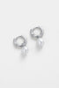 Tessa Pearl hoop - Silver-Zafino-The Tessa Hoop is a modern take on classic pearl earrings, featuring a polished gold hoop paired with a softly shaped freshwater pearl drop. The clean silhouette makes this piece effortlessly versatile — refined enough for events yet minimal enough for everyday wear. Lightweight and timeless, Tessa adds subtle movement and elegance to any look. Wear alone for understated polish or stack with other hoops and huggies for a layered ear moment. An elevated everyday essential des