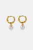 Tessa pearl hoop - gold-Zafino-The Tessa Hoop is a modern take on classic pearl earrings, featuring a polished gold hoop paired with a softly shaped freshwater pearl drop. The clean silhouette makes this piece effortlessly versatile — refined enough for events yet minimal enough for everyday wear. Lightweight and timeless, Tessa adds subtle movement and elegance to any look. Wear alone for understated polish or stack with other hoops and huggies for a layered ear moment. An elevated everyday essential desig