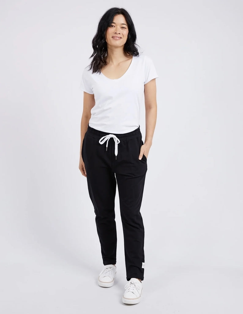 The lobby pant - black-Elm-The lovely lobby pant are a throw on and go style ideal for everyday wear. Featuring an elastic waist and draw cord for extra all-day comfort. Elastic waist and pockets Tapered leg Best seller Made with french terry cotton 95% Cotton, 5% Elastane Model is wearing a size 10-Pash + Evolve