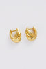 Tia huggie - gold-Zafino-The Tia Huggie in gold is a bold, sculptural take on the everyday hoop. Featuring a twisted, ribbed design with a high-shine finish, it adds texture and dimension while still feeling polished. Designed to stand out in a curated ear or worn solo for impact, it brings an elevated edge to everyday styling. A statement huggie that blends classic shape with a modern, fashion-forward feel. 18K Gold Plating 15mm outer diameter, 5.2mm width Water proof: Can be worn in the ocean or pool-Pas
