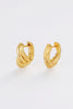 Tia huggie - gold-Zafino-The Tia Huggie in gold is a bold, sculptural take on the everyday hoop. Featuring a twisted, ribbed design with a high-shine finish, it adds texture and dimension while still feeling polished. Designed to stand out in a curated ear or worn solo for impact, it brings an elevated edge to everyday styling. A statement huggie that blends classic shape with a modern, fashion-forward feel. 18K Gold Plating 15mm outer diameter, 5.2mm width Water proof: Can be worn in the ocean or pool-Pas