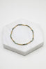 Tilly bracelet - olive-Zafino-The Tilly Bracelet is a stunning elastic bracelet featuring semi-precious stones in a olive green hue. Designed for effortless wear and versatility, this piece adds warmth and elegance to any jewellery collection. *18K Gold Plated Solid Stainless Steel Base *17cm Elastic *Water proof: Can be worn in the ocean or pool-Pash + Evolve